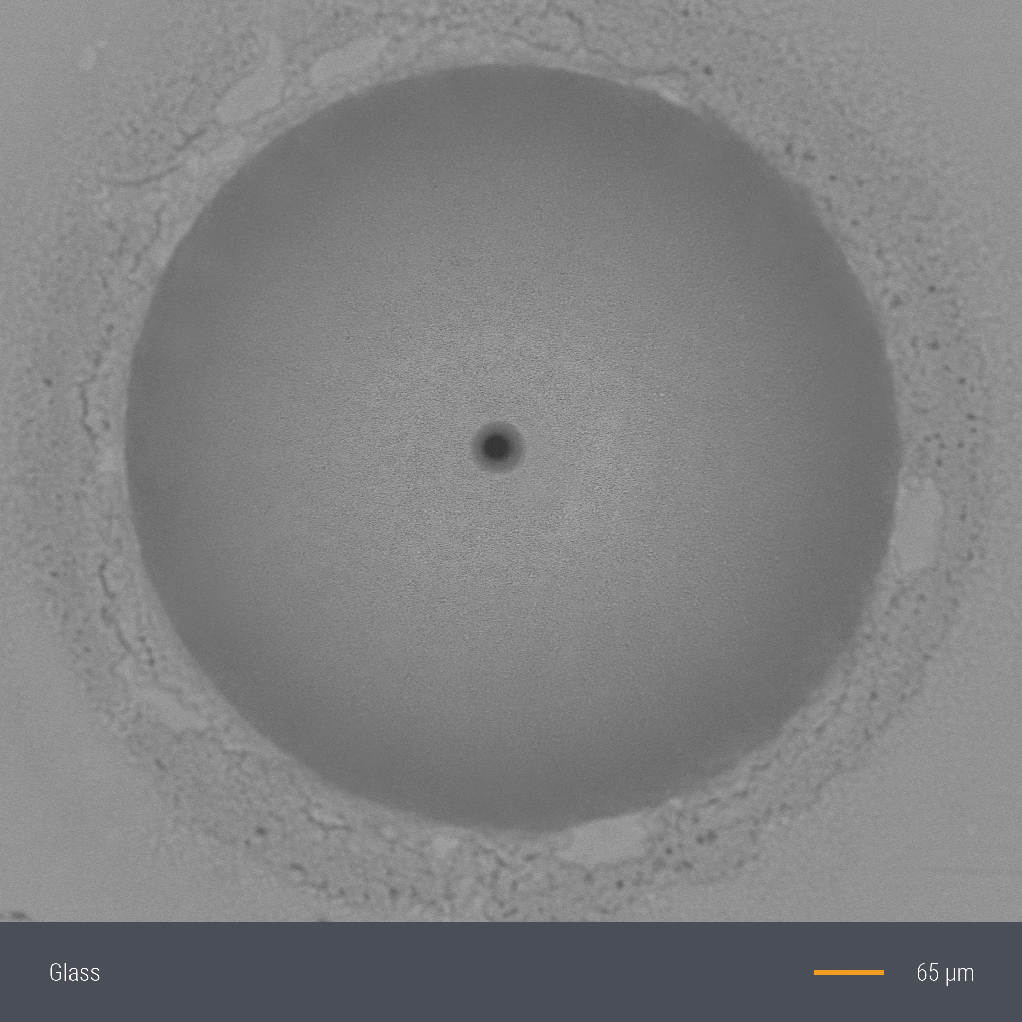 Laser drilling of glass
